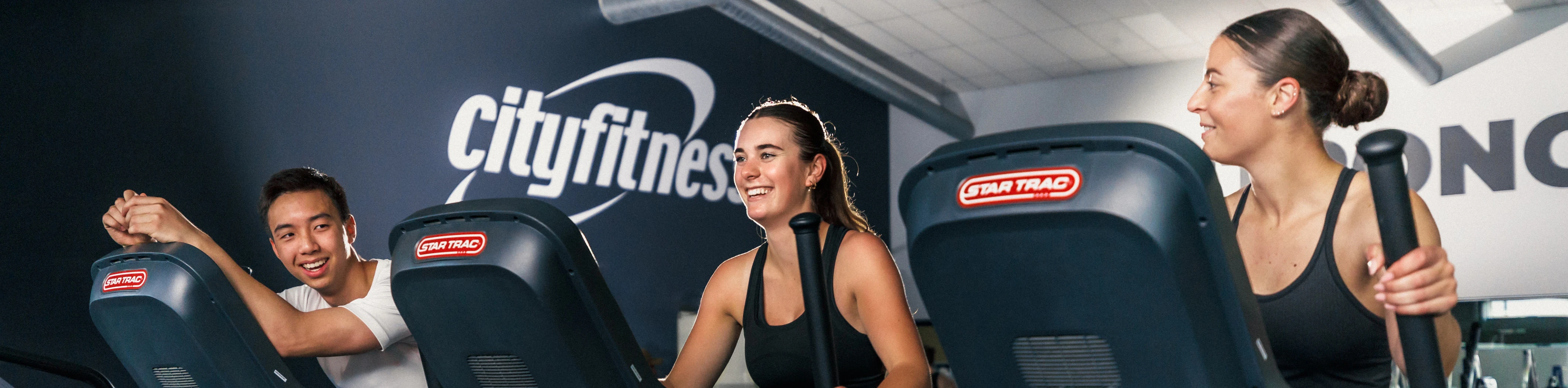 Gym members enjoying a treadmill workout